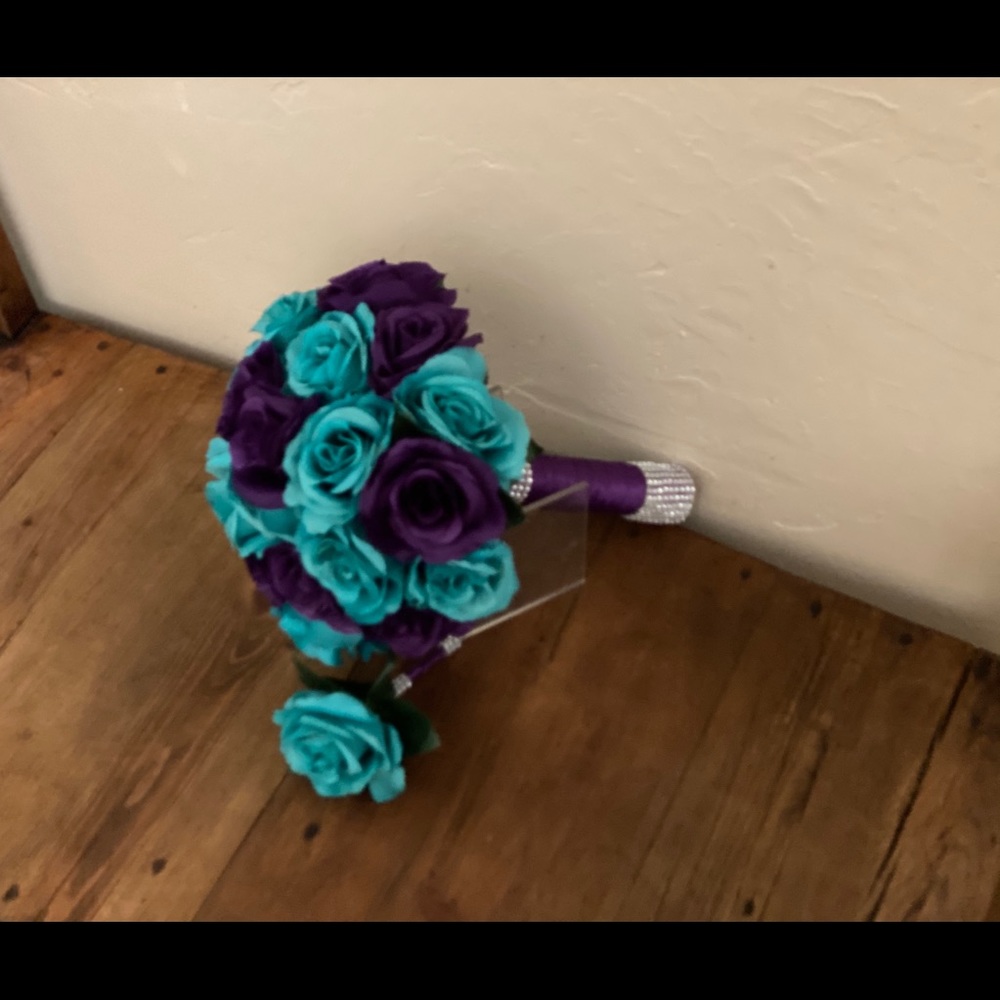 Brides bouquet Purple and Teal roses